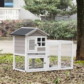 Comparer les prix de Clapier cage à lapins cottage - niche supérieure avec rampe et enclos extérieur - plateau coulissant 4 portes verrouillables