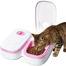 Comparer les prix de Distributeur automatique pour chat 2 bols 700ml minuterie 48h bac amovible pour croquettes et pâtée