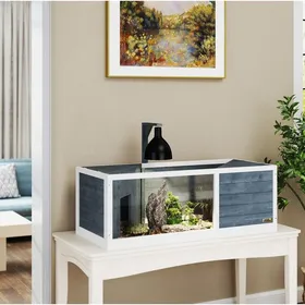 Comparer les prix de Enclos pour tortue 120x50 cm EVRYAE - avec deux abris et couvercle ouvrant panneau frontal transparent - Gris