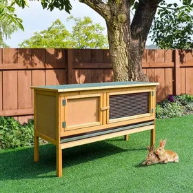 Meilleurs prix pour Clapier en bois pour lapins 115 x 44 3 x 65 cm toit ouvrant deux portes et bac étanche coloris jaune clair Construction stable